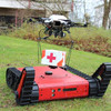 Ground roboter with a UAV flying over it