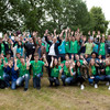 Group photo with Insa Melle and the participants of do-camp-ing. Everyone is wearing early T-shirts and cheering.