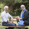 Prof. Stephan Hußmann and Prof. Barbara Welzel, the editors of the anthology on the DoProfiL project, sit on a bench.