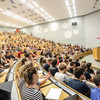 Students sitting in a lecture in the lecture hall.